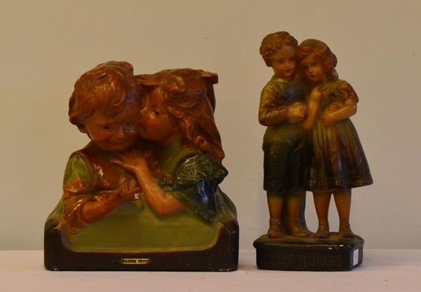 Due sculture, sec. XX, in gesso, raffiguranti                             