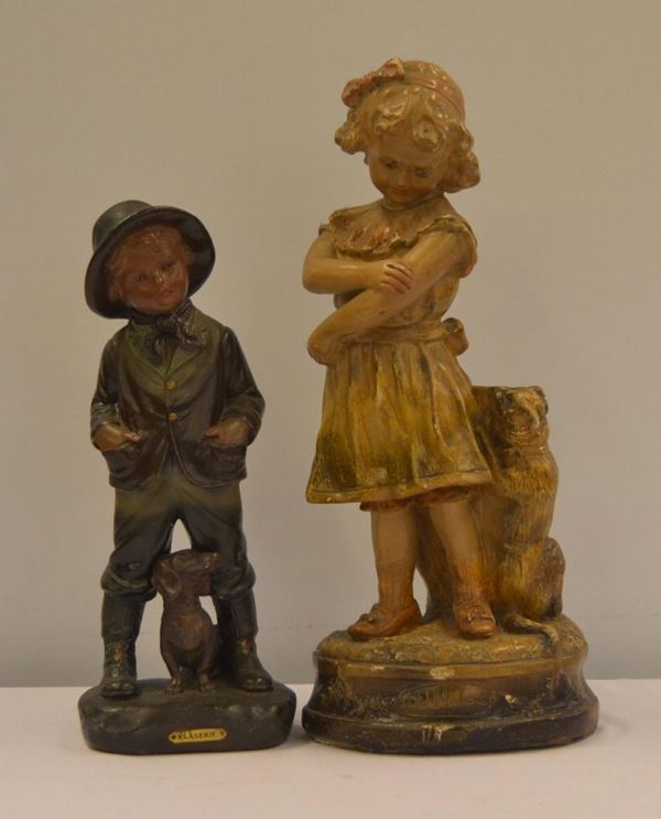 Due sculture, sec. XX, in gesso, raffiguranti&nbsp;&nbsp;&nbsp;&nbsp;&nbsp;&nbsp;&nbsp;&nbsp;&nbsp;&nbsp;&nbsp;&nbsp;&nbsp;&nbsp;&nbsp;&nbsp;&nbsp;&nbsp;&nbsp;&nbsp;&nbsp;&nbsp;&nbsp;&nbsp;&nbsp;&nbsp;&nbsp;&nbsp;&nbsp;  - Asta GIOIELLI, ARGENTI, MOBILI E DIPINTI - Poggio Bracciolini Casa d'Aste