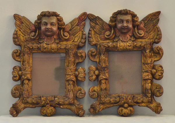 Coppia di cornici, sec. XIX, in legno,