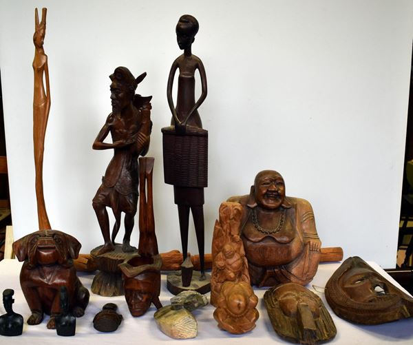 Lotto di quindici tra sculture e maschere, secc. XIX-XX,                  
