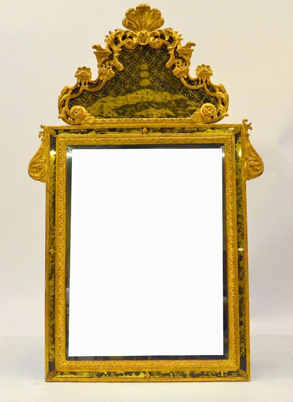Specchiera, in stile '700, entro cornice in legno  - Asta GIOIELLI, ARGENTI, ARREDI, OGGETTI D'ARTE E DIPINTI - Poggio Bracciolini Casa d'Aste