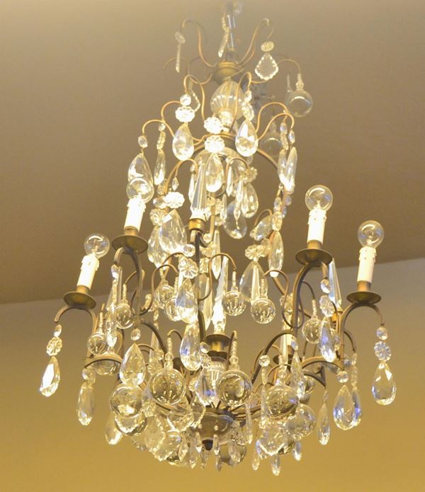 Lampadario, inizi sec. XX, in ferro battuto con