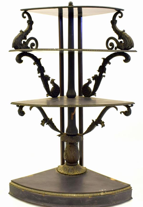 Grande angoliera, fine sec. XIX, in legno intagliato ed ebanizzato, quattro