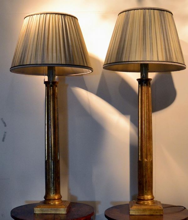 Due lumi, inizi sec. XX, in legno dorato