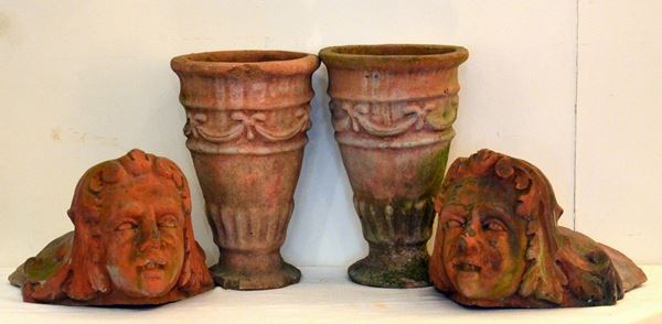 Due vasi, sec. XX, in terracotta, alt. cm 36,