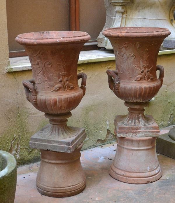 Due vasi, sec. XX, in terracotta lavorata,