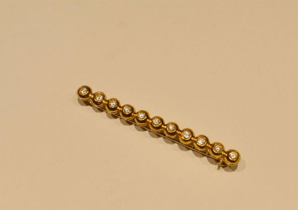 SPILLA IN ORO GIALLO E DIAMANTI