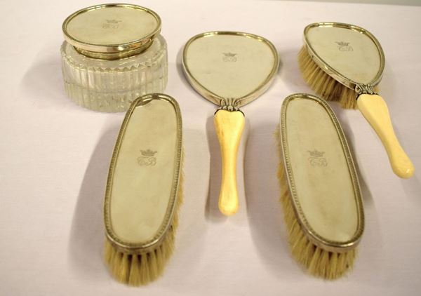 Servito da toilette , sec. XX in argento , avorio e cristallo