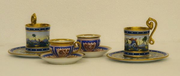 Due tazzine con piattini, inizi sec. XX, in maiolica