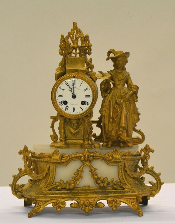 Orologio da tavolo, inizi sec. XX, in metallo dorato e