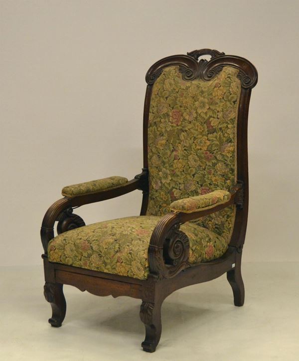 Poltroncina, sec. XIX, in noce intagliato,