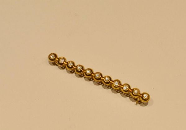 SPILLA IN ORO GIALLO E DIAMANTI