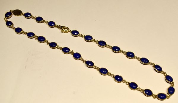 GIROCOLLO IN ORO GIALLO&nbsp; E LAPISLAZZULO  - Asta GIOIELLI, ARREDI D'ANTIQUARIATO, DIPINTI E SCULTURE - Poggio Bracciolini Casa d'Aste