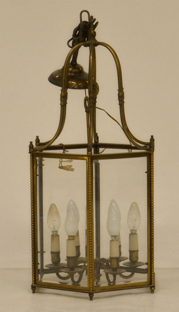 Lampadario, inizi sec. XX, in metallo dorato,
