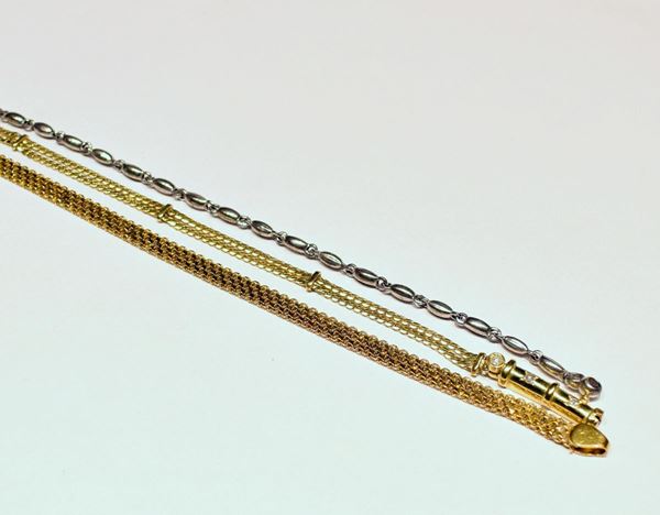 DUE BRACCIALI , IN ORO GIALLO E DIAMANTI