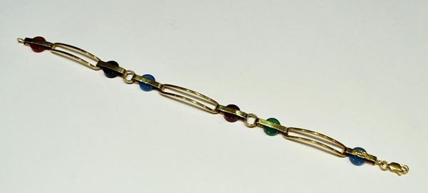 BRACCIALE IN ORO GIALLO E PIETRE