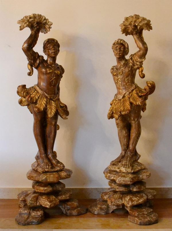 Coppia di sculture, sec. XX, in legno