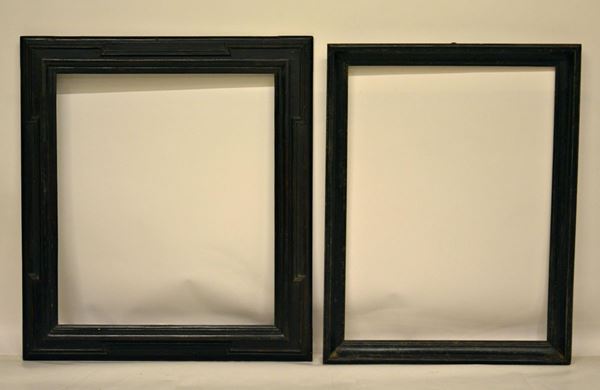 Due cornici, sec. XIX, in legno laccato nero,