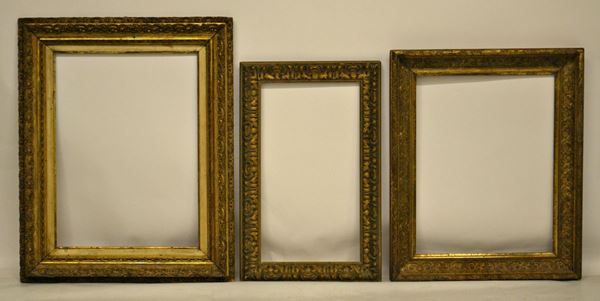 Tre cornici, inizi sec. XX, in legno e pastiglia,