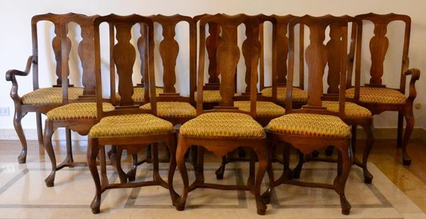 Coppia di poltrone e dieci sedie, in stile '700,