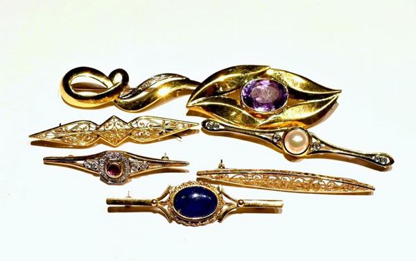 SETTE SPILLE IN ORO GIALLO E PIETRE PREZIOSE  - Asta ANTIQUARIATO, COLLEZIONISMO E GIOIELLI - Poggio Bracciolini Casa d'Aste