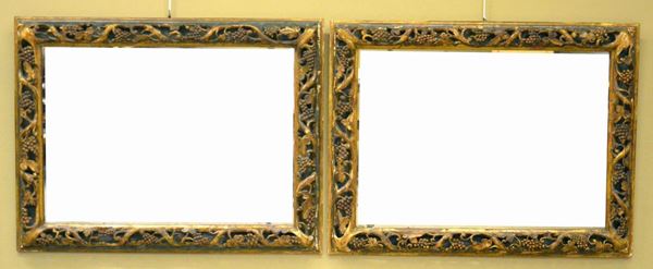 Due specchiere, in stile '700, entro cornici in legno