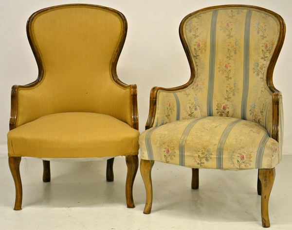 Due poltroncine, sec. XIX, in noce, imbottite