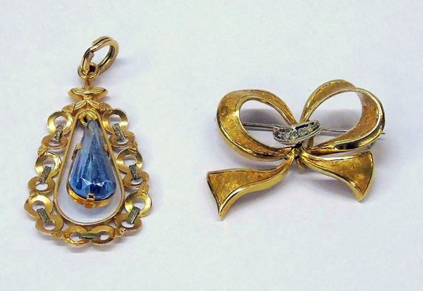 SPILLA IN ORO GIALLO E DIAMANTI