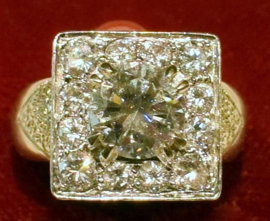 ANELLO IN ORO GIALLO , ORO BIANCO E DIAMANTE