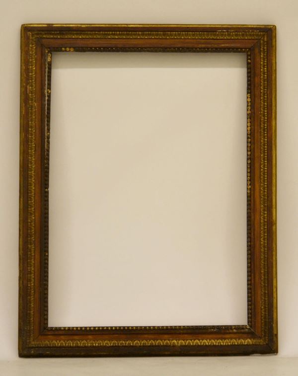 Cornice, sec. XVIII, in legno intagliato e dorato,