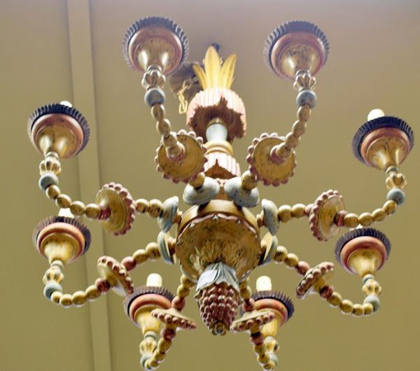 Lampadario, inizi sec. XX, in legno laccato,