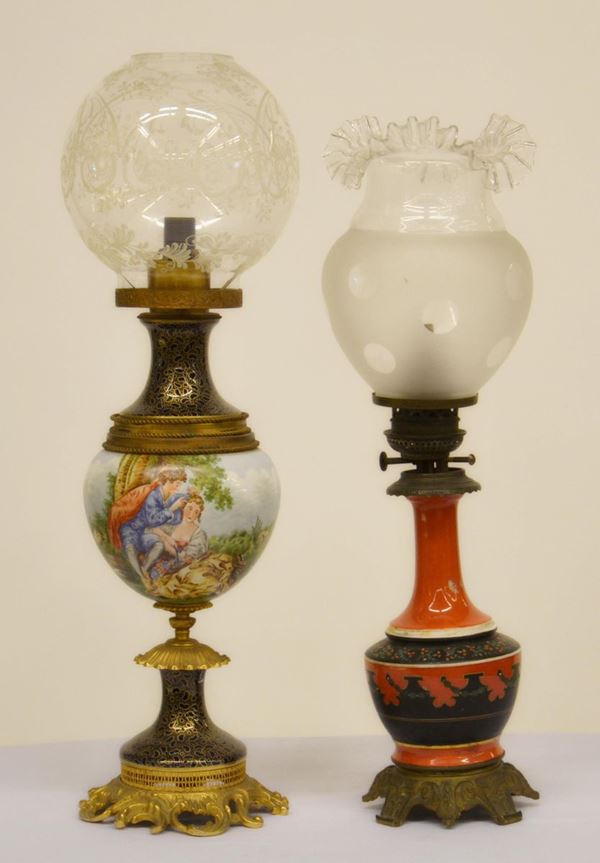 Due lumi da tavolo, sec. XX, in ceramica