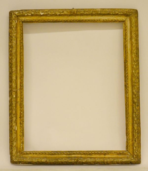 Cornice, sec. XVIII, in legno intagliato e dorato,