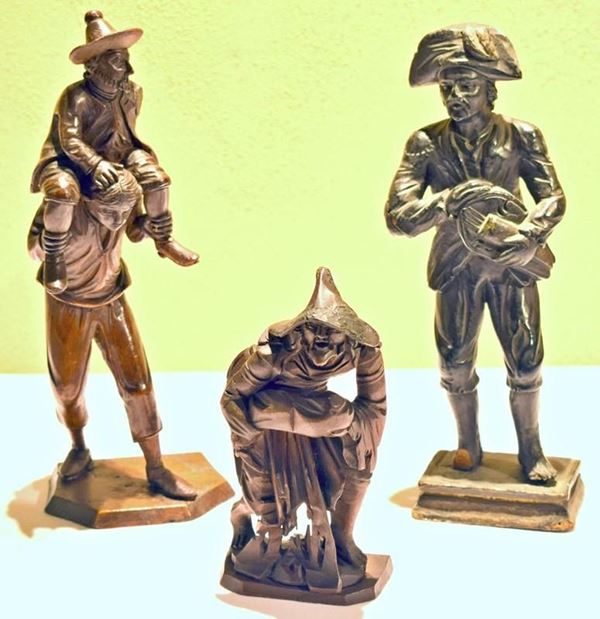 Tre sculture, sec. XVIII, in legno intagliato,