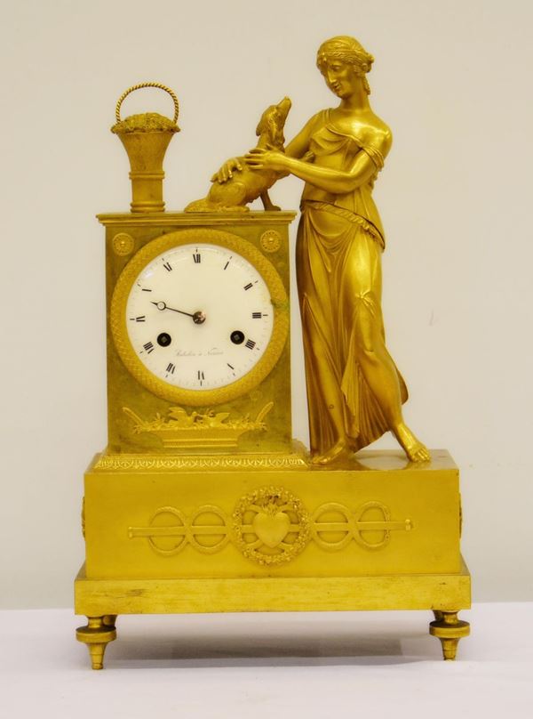 Orologio da tavolo, sec. XIX, in bronzo dorato con