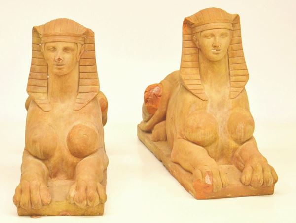Due sculture, sec. XX, in terracotta,