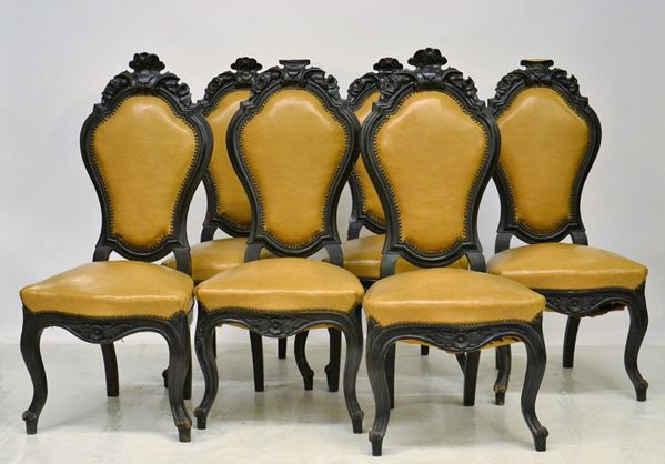 Sei sedie, sec. XIX, in legno ebanizzato e intagliato,