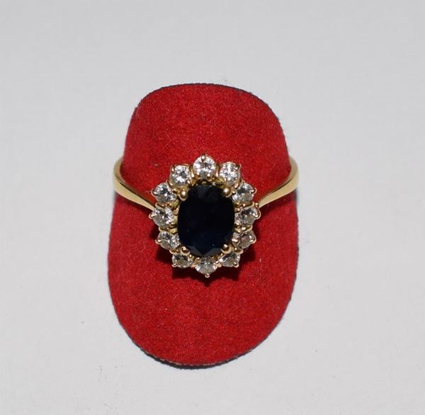 ANELLO IN ORO GIALLO , DIAMANTI E ZAFFIRO