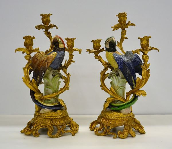 Coppia di candelabri a tre fiamme, sec. XX,                               