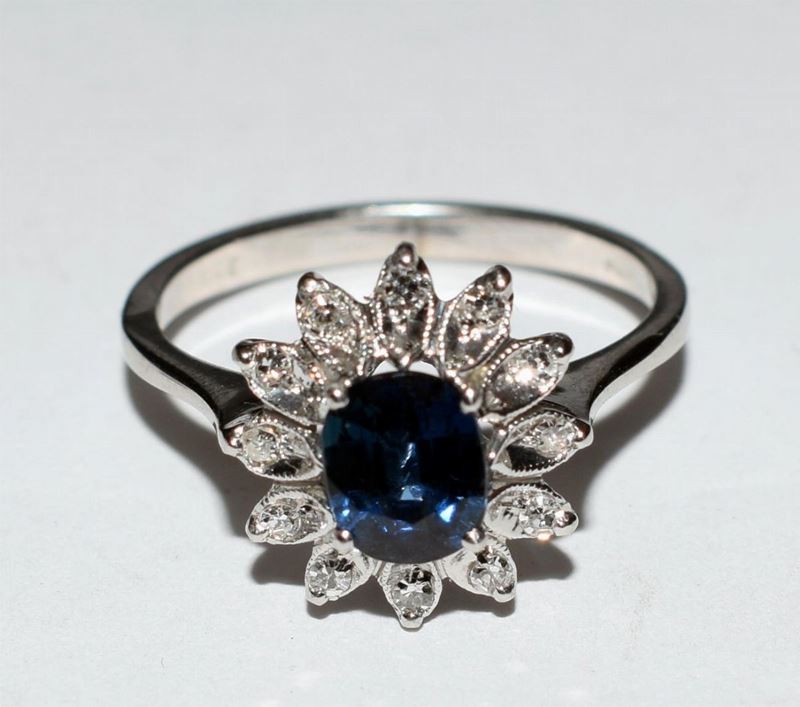 Anello in Oro Bianco,diamanti e Zaffiro