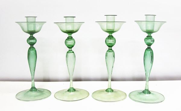 Quattro candelieri, sec. XX  - Asta GIOIELLI, ARREDI D'ANTIQUARIATO, DIPINTI E SCULTURE - Poggio Bracciolini Casa d'Aste