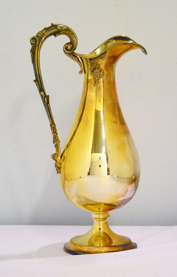 Versatoio in argento liscio piriforme con                                   - Asta GIOIELLI, BENI D'ANTIQUARIATO E DIPINTI DAL XVII AL XX SECOLO - Poggio Bracciolini Casa d'Aste