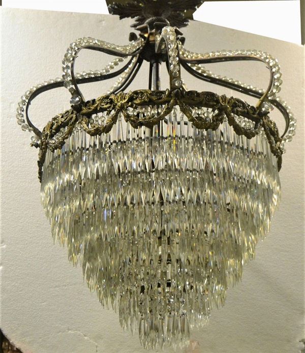 Lampadario, inizi sec. XX, in bronzo forgiato a