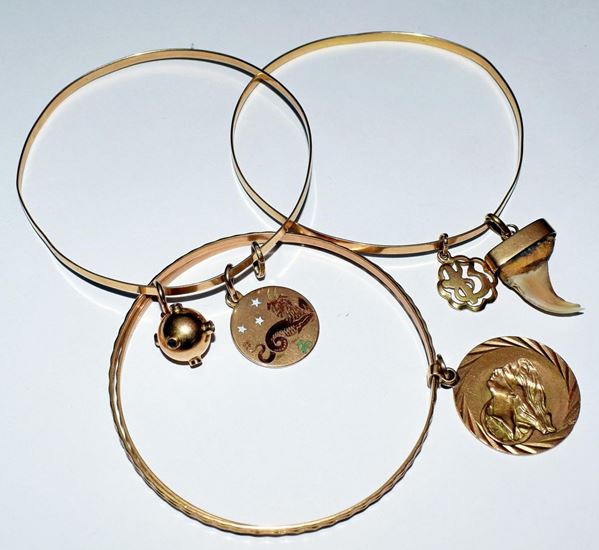 TRE BRACCIALI IN ORO GIALLO