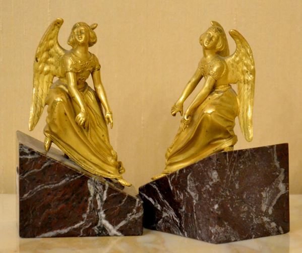 Coppia di fermalibri, sec. XIX, in bronzo