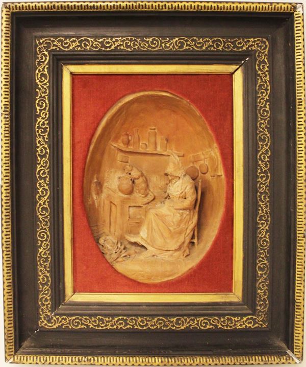 Terracotta ovale, fine sec. XIX, raffigurante scena d&#8217; interno, in cornice, cm 29x40