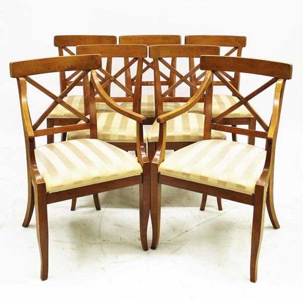Due poltroncine e cinque sedie, in stile neoclassico, in ciliegio, schienale a giorno a traverse decussate, rivestite in stoffa a righe, gambe anteriori sciabolate, alt. cm 93, (7)