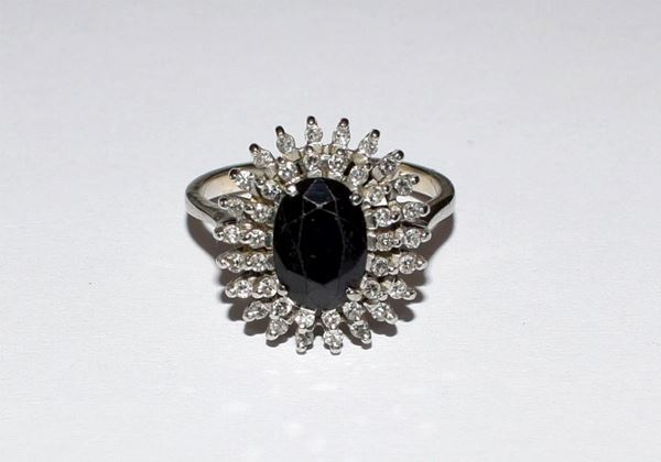 ANELLO IN ORO BIANCO , DIAMANTI E ZAFFIRO