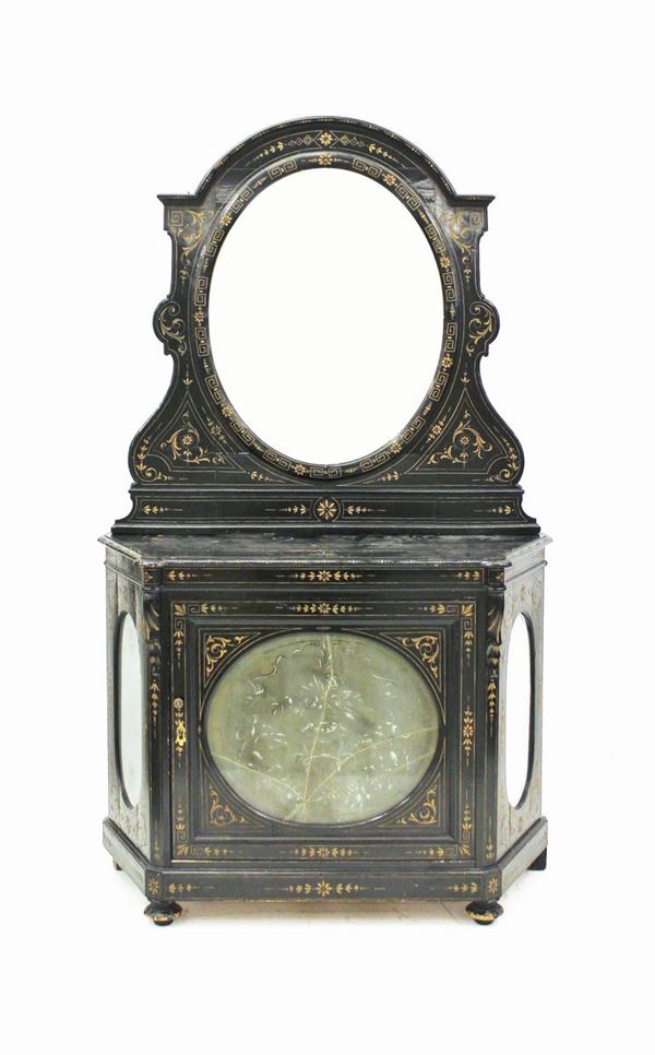 Credenza, Francia, fine sec. XIX, in legno ebanizzato decorato a intaglio lumeggiato, fronte scantonato ad uno sportello, fianchi e fronte centrati da riserve vetrate ovali, grande specchiera ovale molata a cornice fortemente sagomata, cm 129x43x220, difetti