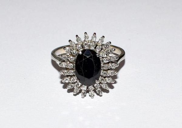 ANELLO IN ORO BIANCO , DIAMANTI E ZAFFIRO
